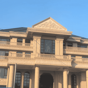 长治黄金麻别墅外墙干挂石材效果示例