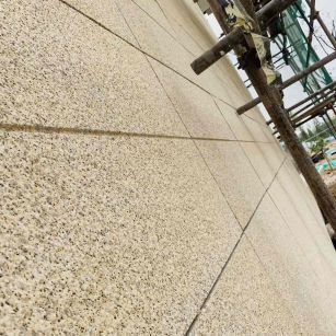 长治 黄金麻花岗岩荔枝面外墙干挂石材效果示例