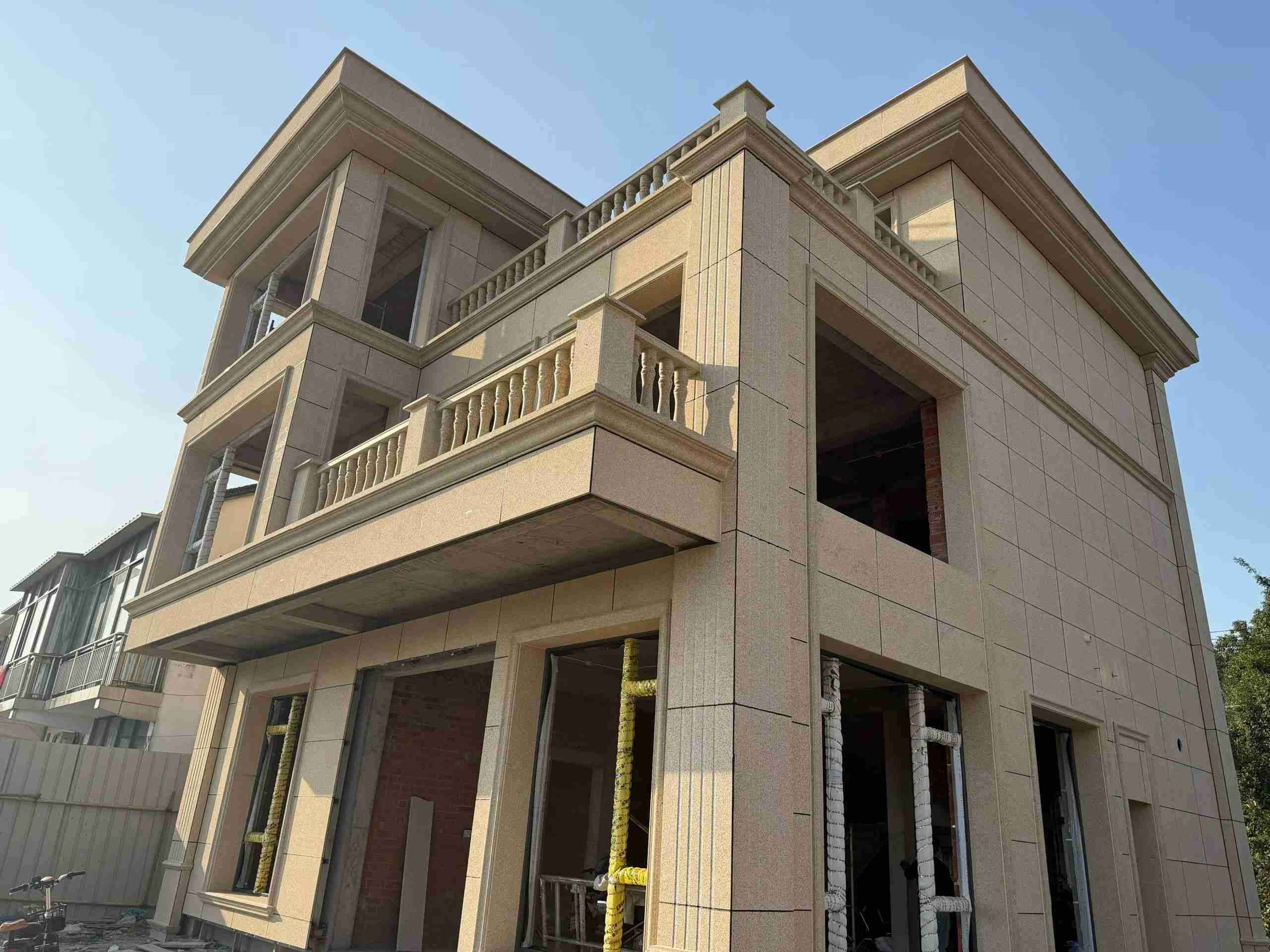 长治 黄金麻花岗岩石材荔枝面外墙干挂效果展示