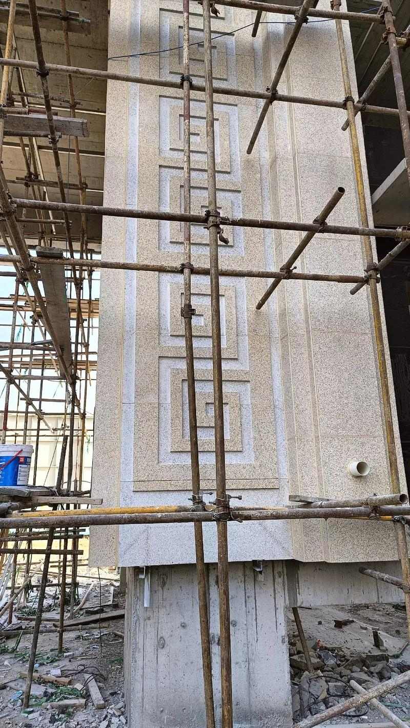 长治 黄金麻花岗岩别墅外墙干挂回纹造型效果